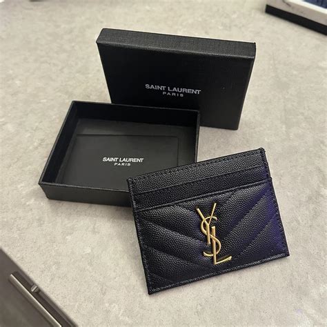 how to spot fake ysl card holder|ysl card holder authenticity.